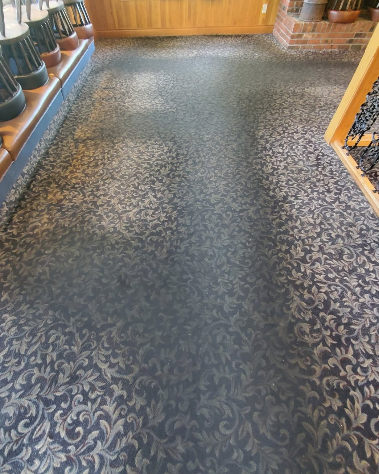 Before — Before and after commercial carpet cleaning on a patterned Okanagan restaurant floor